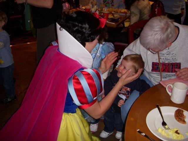 My nephew getting his first kiss from Snow White My nephew getting his first kiss from Snow White
