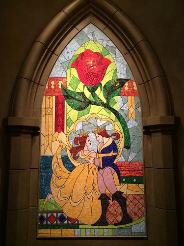 Stained glass window in the lobby of Be Our Guest