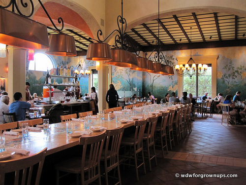 Communal dining table inside Via Napolil