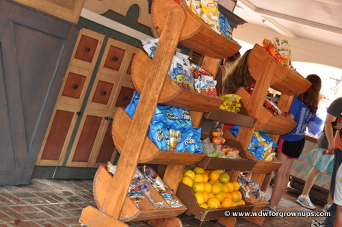 Assorted Chips and Fresh Fruit At The Market