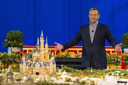 Disney CEO Bob Iger with scale model of Shanghai Disneyland