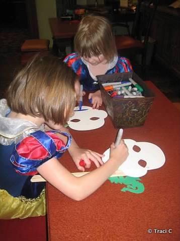 Kids can decorate their cardboard figures at Kidcot Stops