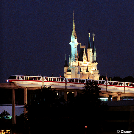 Monorail Red Slides Past Cinderella Castle