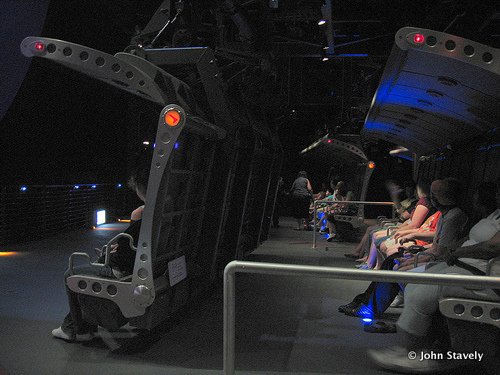 Guests Buckle in to Soarin' Ride Vehicles