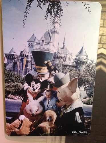 A photo of Walt with some classic characters at Disneyland